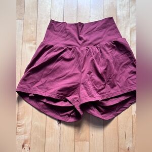 HALARA High-Rise Athletic Shorts in Burgundy Plum